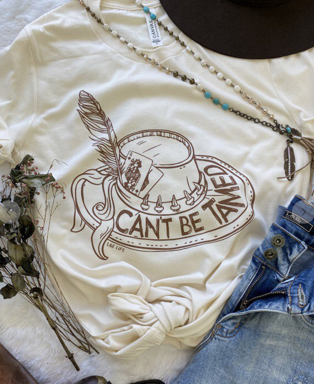 Can't Be Tamed Graphic T
